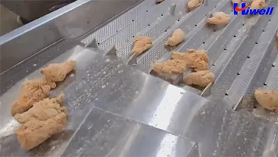 Línea de rebozado de muslos de pollo